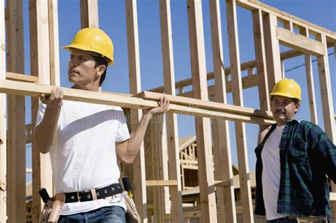 Men Working At A Construction Site Stock Photo Image Of Contractor