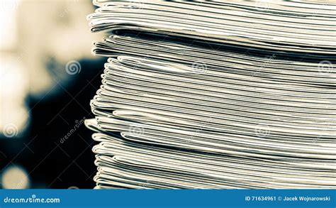 Newspapers Folded And Stacked Background On The Table Stock Photography