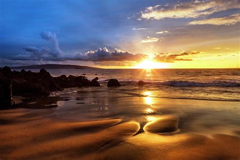 A Golden Sunset With Reflection On Sand Photograph By Jenna Szerlag