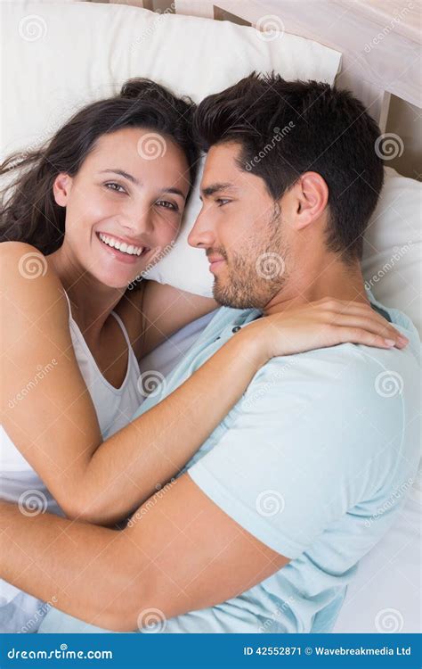 Attractive Couple Cuddling On Bed Stock Image Image Of Brown Abode 42552871