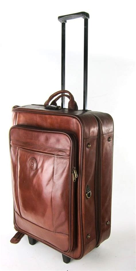 The ability to visit other lands to gain knowledge and experience has become one of life's luxuries for most of us. BARRY SMITH BROWN GENUINE LEATHER WHEELED ROLLING SUITCASE ...