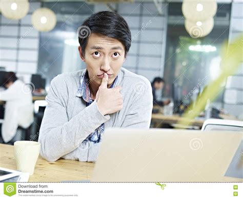 Young Asian Business Person Thinking Hard In Office Stock Image Image