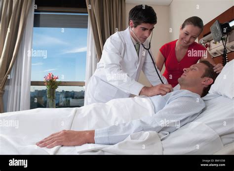 Doctor Examining Patient Hi Res Stock Photography And Images Alamy