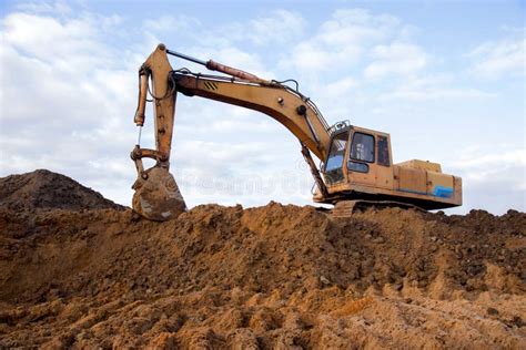 Track Type Excavator During Earthmoving Work At Open Pit Mining Loader
