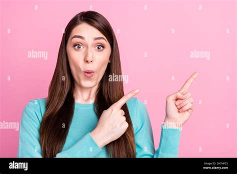 Portrait Of Attractive Amazed Cheerful Girl Showing Copy Space Pout Lips Offer Isolated Over