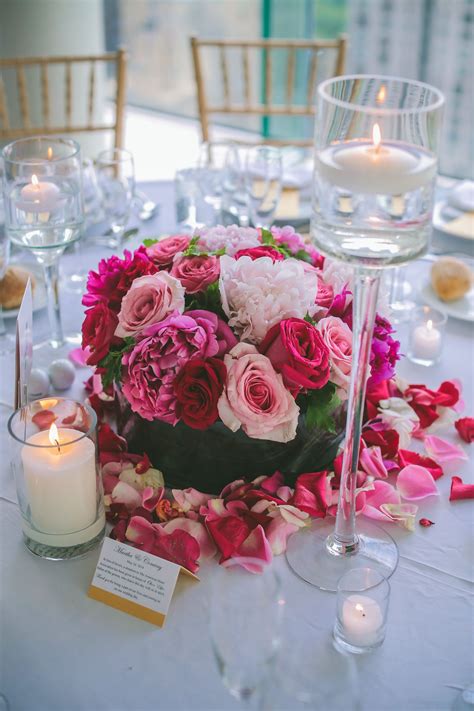 Romantic Candles And Pink Flower Arrangement Centerpiece