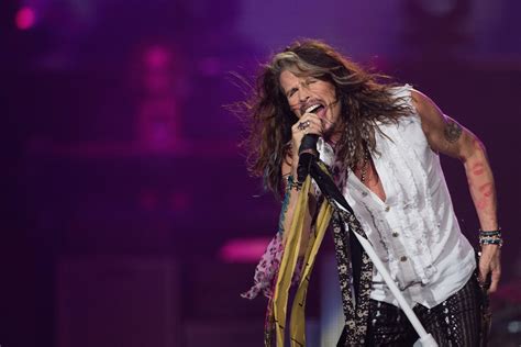 Why Aerosmith's Steven Tyler Ties Scarves Around His Mic Stand