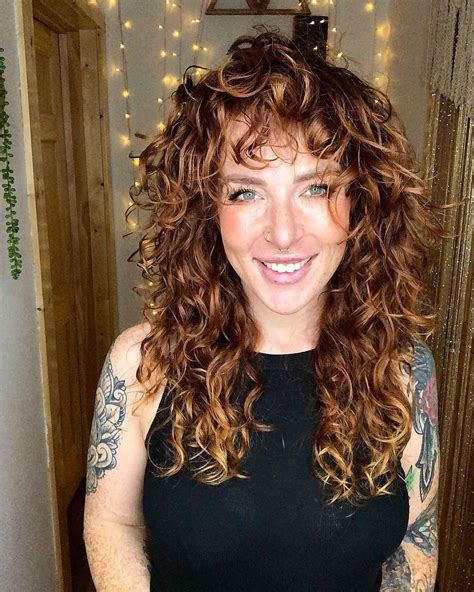 25 Most Flattering Wolf Cuts For Curly Hair Shaggy Curly Hair Long