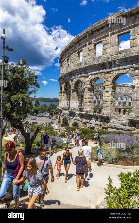 Tourists Seen Visiting The Pula Arena Roman Amphitheatre Located In