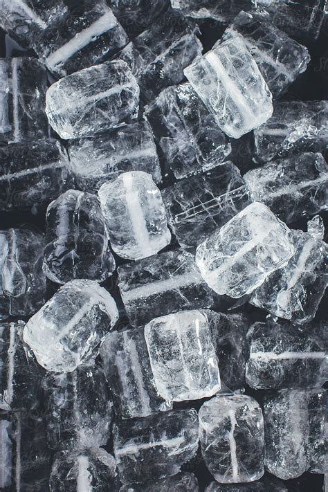 Ice Cubes Over Black Background By Stocksy Contributor Bonninstudio