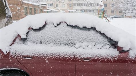 The Car Covered With Thick Layer Of Snow Negative Consequence Of