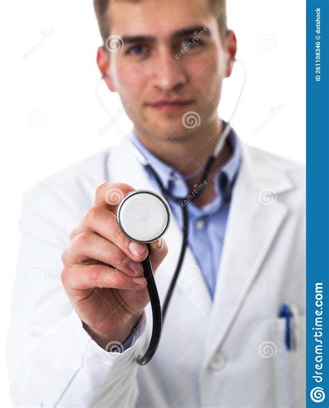 Portrait Of Hero In A White Coat Cheerful Smiling Young Doctor With A