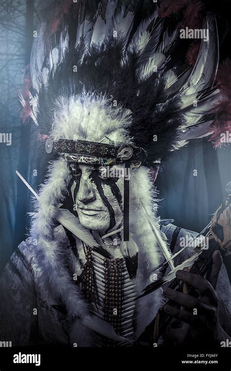 American Indian Warrior Chief Of The Tribe Man With Feather Headdress