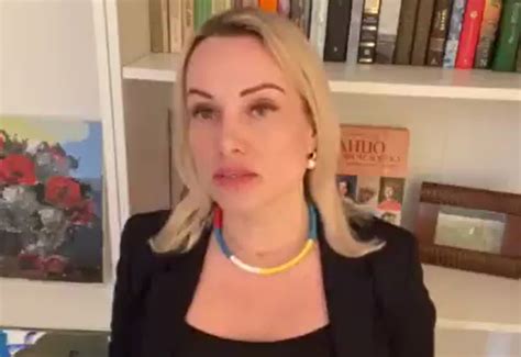 anti war activist interrupts live russian state tv news show express and star