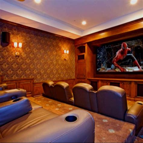 The smith's family's screening room includes luxurious upholstered club chairs. Nice but simple theater room | Home, Celebrity houses ...