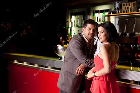 Young Couple In Bar Talking — Stock Photo © Shotsstudio 6277272