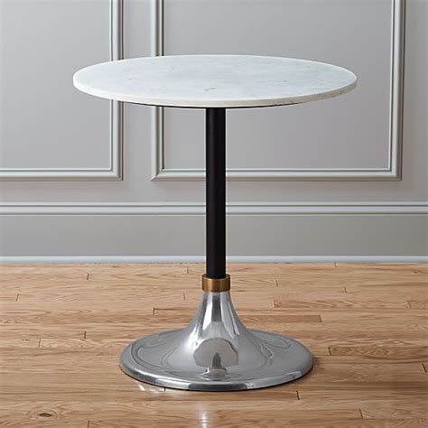 White volakas marble tops the piece with beautiful tonal variation and veining. hackney marble cocktail table | CB2