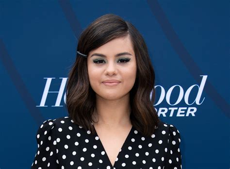 Selena Gomez Just Wore A 500 Suit With Mens Sneakers Glamour