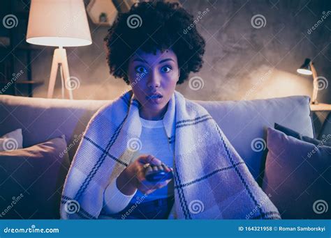 Portrait Of Astonished Crazy Afro American Girl Watch Horror Series Hold Remote Control Switch