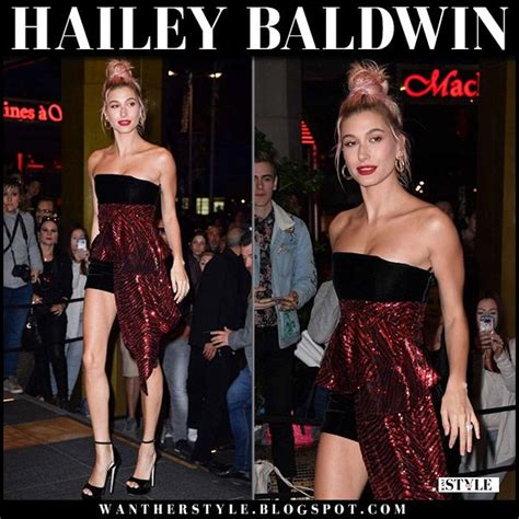 hailey baldwin in black and red strapless mini dress in cannes on may 12