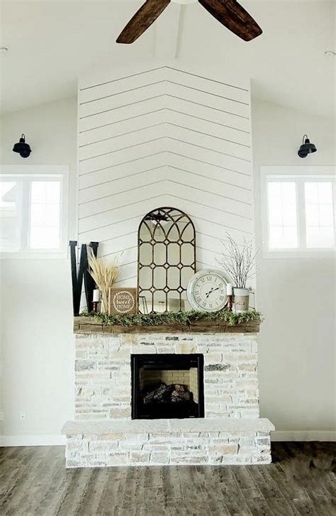 They really lightened the room up by painting the brick and wood trim + shelves a nice, bright white and then added the shiplap above the make it look nice and finished. Modern Farmhouse Fireplace Ideas that You Should Copy ...