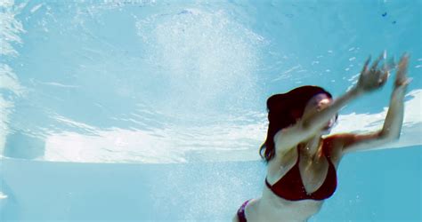 Drowned Woman Body Floating In A Swimming Pool Facing Up Stock Footage Video Shutterstock