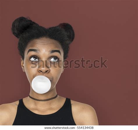 African Woman Blowing Bubble Gum Playful Stock Photo 554134438