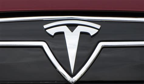Logo Tesla Signification Et Histoire Du Symbole De La Vrogue Co