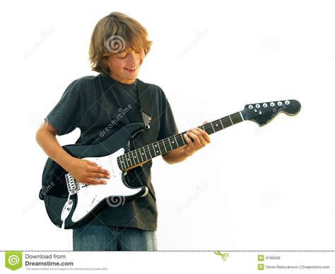 Muchacho Adolescente Sonriente Que Toca La Guitarra Fotos De Archivo