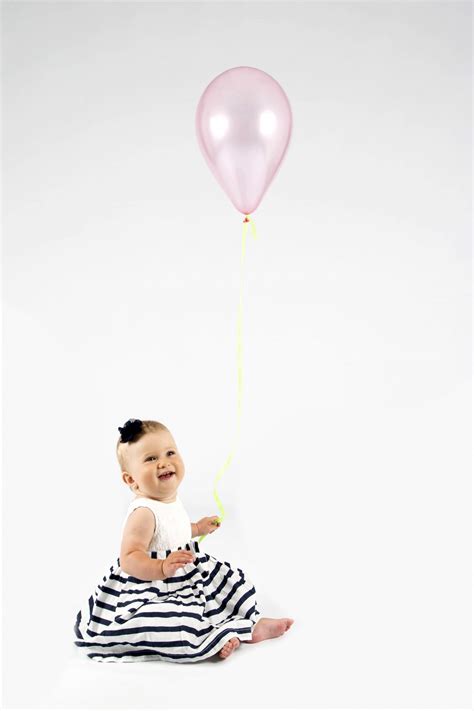 Baby Girl Holding Balloon Free Stock Photo Public Domain Pictures
