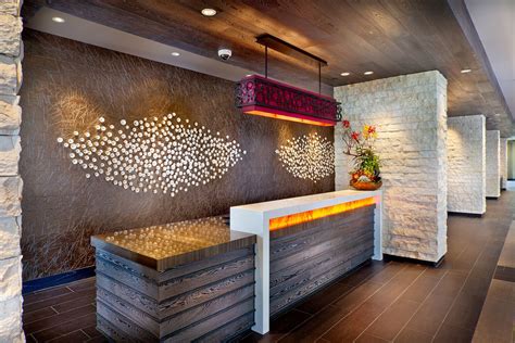 The front office reception staff receives the guest in the reception. Front Desk | Reception desk design, Front desk design ...