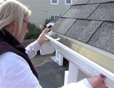 This isn't always possible on long gutter runs because the gutters need to be pitched so the water flows to the downspouts, which means one end will need to be hung high. DIY Gutters - Good Idea or Not Worth It? See Here..