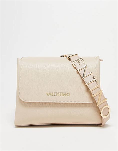 valentino bags alexia metal logo strap cross body bag in ecru asos