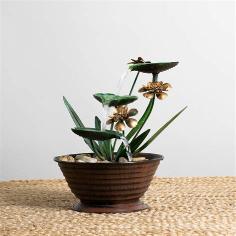 They are sophisticated mixture between modeling and gardening. Foreside Home & Garden Metal Lily Pad Fountain & Reviews ...
