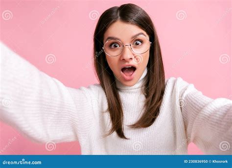 Shocked Young Adult Female Taking Selfie Having Astonished And Scared