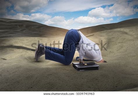 Businessman Hiding His Head Sand Escaping Stock Photo 1039741963