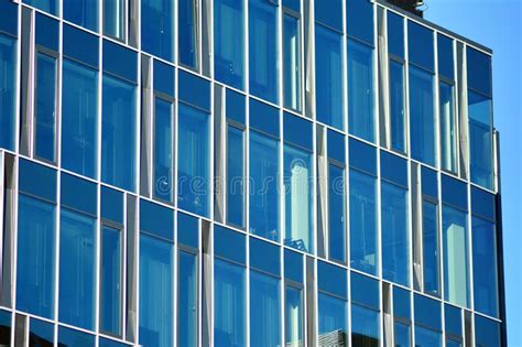 Modern Office Building Facade Abstract Fragment Shiny Windows In Steel