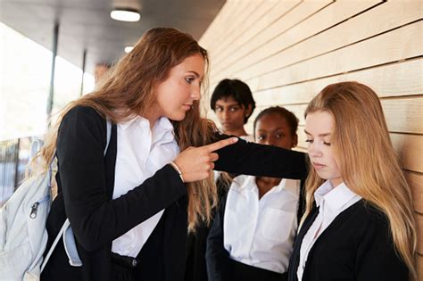 Teenage Girl Being Bullied At School Stock Photo Download Image Now