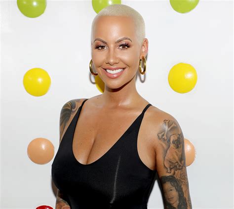 amber rose looks totally different with long wavy hair pic