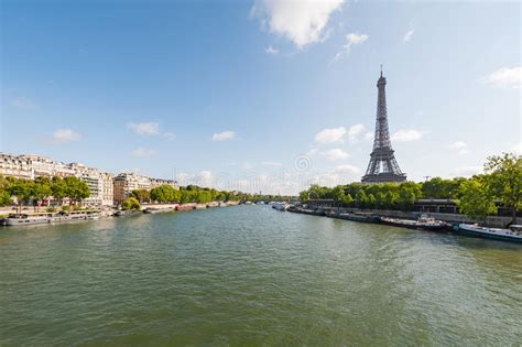 Paris And Eiffel Tower With River Seine In The Foreground On A S Stock
