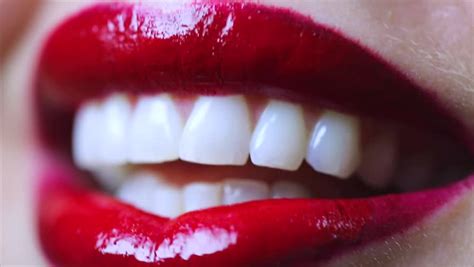 Extreme Close Up Of Licking Teeth And Smiling Stock