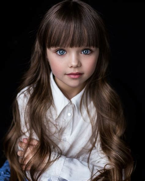Baby Girl With Blue Eyes And Brown Hair