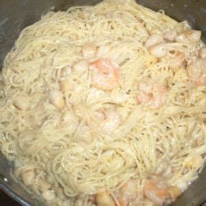 A classic combination of seafood and pasta, angel hair pasta with shrimp, tomatoes and fresh basil makes for a simple, but elegant dinner with incredible flavors! Shrimp & Scallop Alfredo Angel-Hair Pasta -A seafood ...