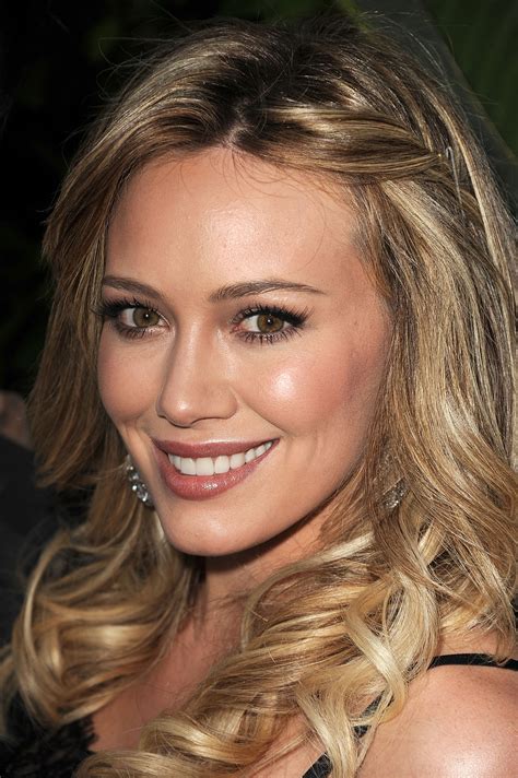 Hilary Duff Relaxes In Bathing Suit