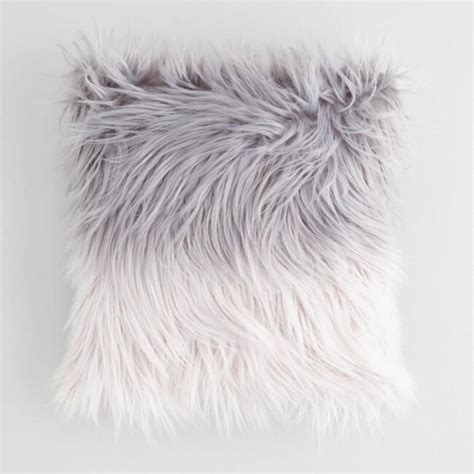 A hidden zipper keeps the look clean a. World Market grey and white ombre faux fur throw pillow ...