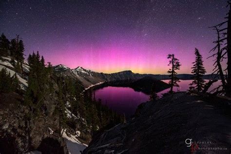 Stunning Picture Of A Pink Aurora Over Crater Lake Crater Lake