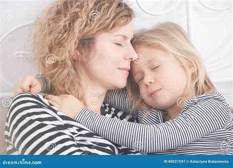 Little Girl Hugging Her Mom While Sleeping Stock Image Image Of Bonds