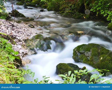 Stream Of Water In Long Time Exposure On A Little Brook Stock Image