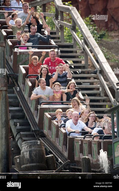 Holidaymakers Enjoying A Rollercoaster Ride On Big Thunder Mountain