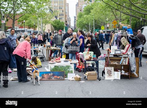 Shoppers search bargains flea market hi-res stock photography and